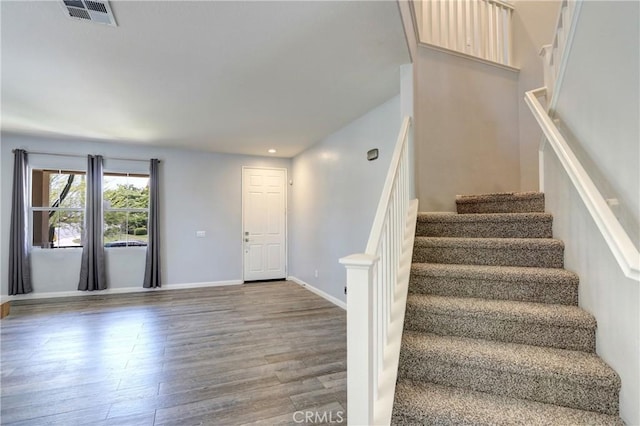 19068 Sunflower Pl, Riverside, CA 92508 - stairway with wood finished floors and recessed lighting