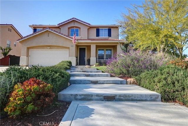 19068 Sunflower Pl, Riverside, CA 92508 - mediterranean / spanish house with stucco siding, a porch, and a garage