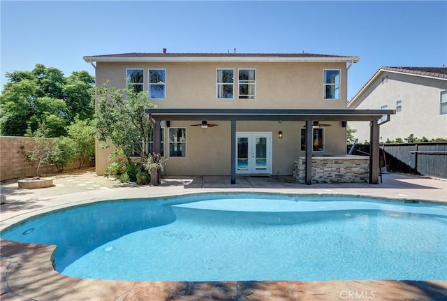 19068 Sunflower Pl, Riverside, CA 92508 - back of property featuring french doors, a fenced backyard, a patio area, ceiling fan, and stucco siding