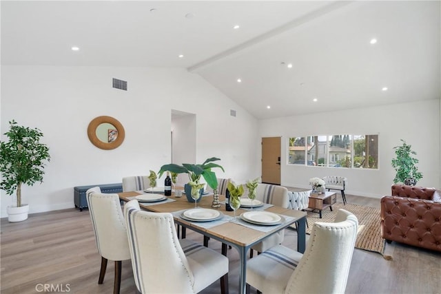 2536 Cotner Ave, Los Angeles, CA 90064 - dining room featuring beamed ceiling, light wood-style floors, high vaulted ceiling, and recessed lighting