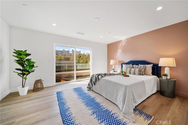 2536 Cotner Ave, Los Angeles, CA 90064 - bedroom featuring access to exterior, light wood finished floors, and recessed lighting