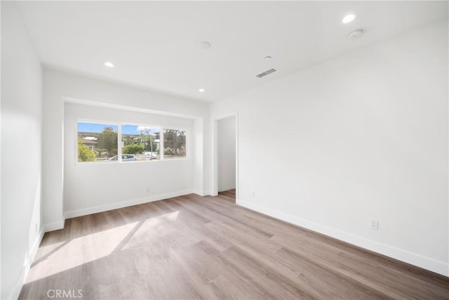 2536 Cotner Ave, Los Angeles, CA 90064 - empty room featuring wood finished floors, recessed lighting, and a smoke detector