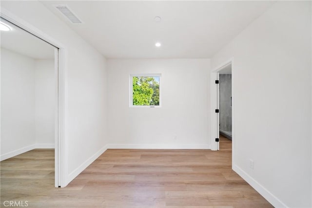 2536 Cotner Ave, Los Angeles, CA 90064 - unfurnished bedroom with light wood-style floors, recessed lighting, and a closet