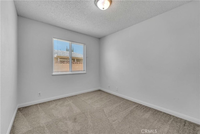 45121 17th St W, Lancaster, CA 93534 - empty room featuring carpet and a textured ceiling