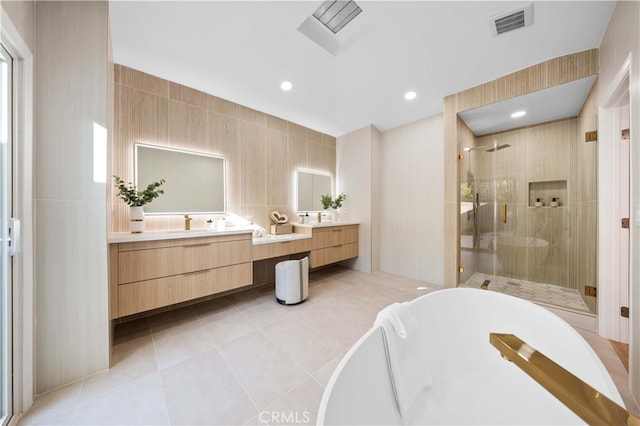 29805 Knoll View Dr, Rancho Palos Verdes, CA 90275 - full bathroom with a freestanding bath, a stall shower, vanity, tile patterned floors, and tile walls