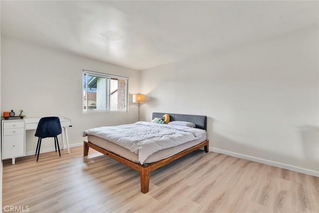 2300 S Hacienda Blvd Unit D8, Hacienda Heights, CA 91745 - bedroom with light wood-type flooring and an office area