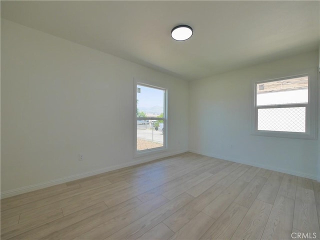 24931 Vine St, San Bernardino, CA 92410 - empty room with light wood-type flooring