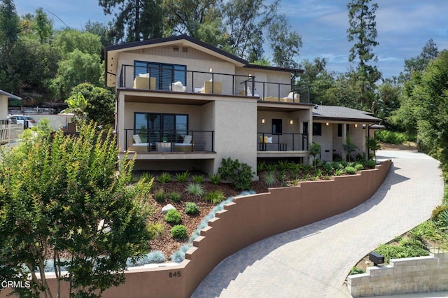 845 Rollin St, South Pasadena, CA 91030 - view of front of property featuring a balcony and stucco siding