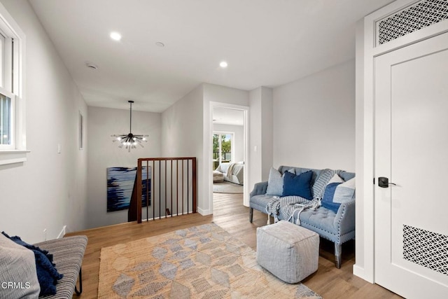 845 Rollin St, South Pasadena, CA 91030 - sitting room with wood finished floors, recessed lighting, and an upstairs landing
