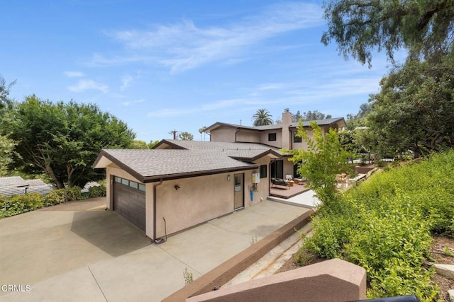 845 Rollin St, South Pasadena, CA 91030 - view of front of property with a chimney, stucco siding, an attached garage, and a shingled roof