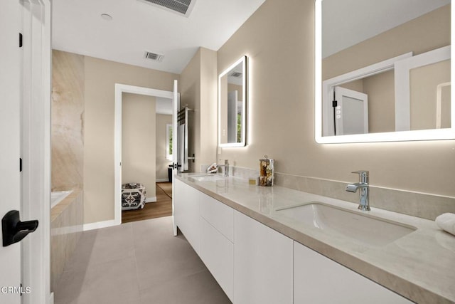845 Rollin St, South Pasadena, CA 91030 - full bath featuring double vanity, tile patterned floors, and a tub