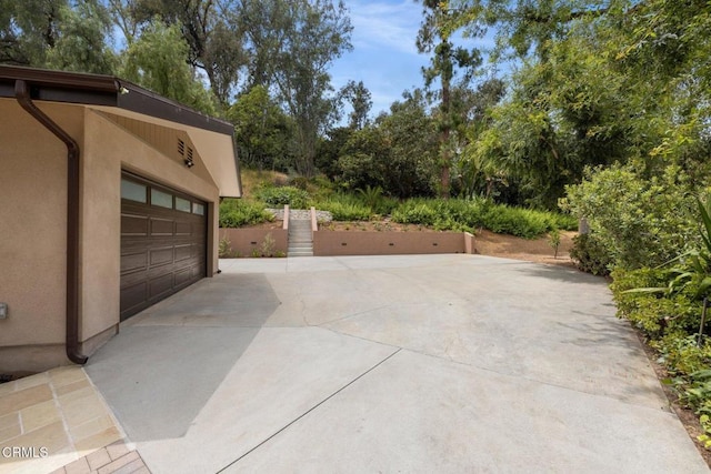 845 Rollin St, South Pasadena, CA 91030 - garage featuring view of scattered trees