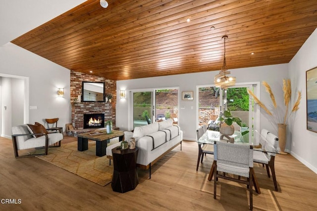 845 Rollin St, South Pasadena, CA 91030 - living room featuring wood ceiling, a fireplace, and light wood-style flooring