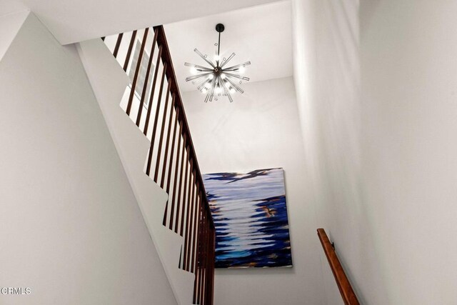 845 Rollin St, South Pasadena, CA 91030 - stairway featuring a chandelier