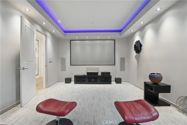 28410 Orange Park Dr, Castaic, CA 91384 - home theater room with a tray ceiling, wood finished floors, and recessed lighting