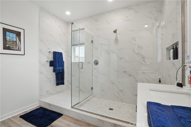 28410 Orange Park Dr, Castaic, CA 91384 - full bathroom with a marble finish shower, wood finished floors, recessed lighting, and vanity