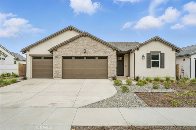 28410 Orange Park Dr, Castaic, CA 91384 - single story home with an attached garage, stucco siding, driveway, and stone siding