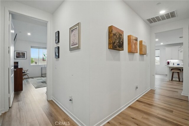 28410 Orange Park Dr, Castaic, CA 91384 - corridor with light wood-type flooring, an office area, and recessed lighting