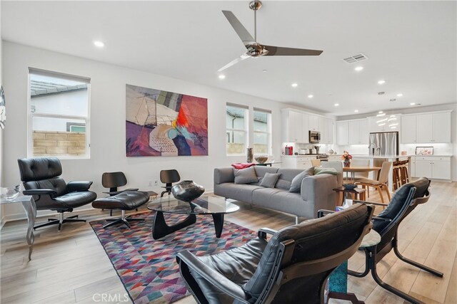 28410 Orange Park Dr, Castaic, CA 91384 - living room featuring healthy amount of natural light, ceiling fan, light wood-style floors, and recessed lighting