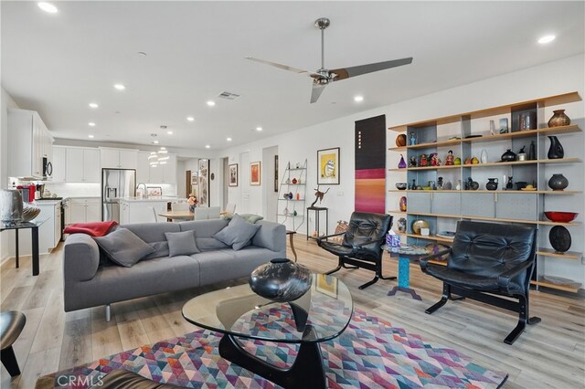 28410 Orange Park Dr, Castaic, CA 91384 - living area featuring light wood-style floors, ceiling fan, and recessed lighting