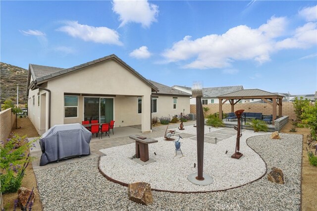 28410 Orange Park Dr, Castaic, CA 91384 - rear view of house with a gazebo, a patio area, and a fenced backyard