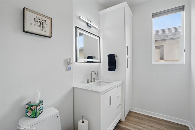 28410 Orange Park Dr, Castaic, CA 91384 - half bathroom featuring vanity and wood finished floors