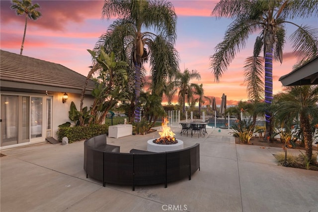 1042 Coronet Dr, Riverside, CA 92506 - view of patio featuring an outdoor fire pit