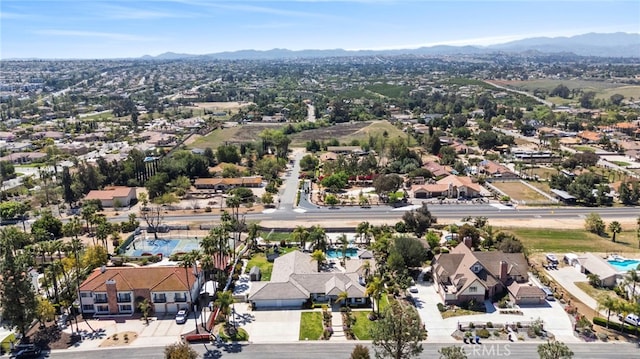 1042 Coronet Dr, Riverside, CA 92506 - aerial perspective of suburban area with a mountain backdrop