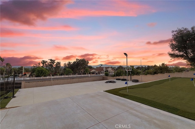 1042 Coronet Dr, Riverside, CA 92506 - view of property's community with an area to practice putting and a patio