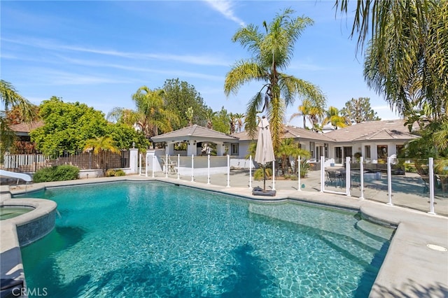 1042 Coronet Dr, Riverside, CA 92506 - view of pool featuring a gazebo, a patio, a pool with connected hot tub, and a water slide