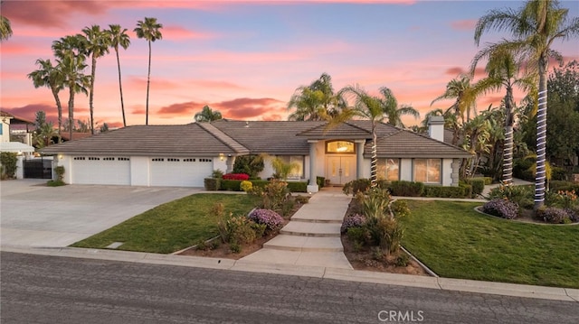 1042 Coronet Dr, Riverside, CA 92506 - single story home with driveway, a front yard, a garage, and a tile roof