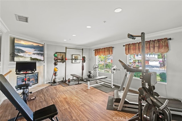 1042 Coronet Dr, Riverside, CA 92506 - exercise area with ornamental molding, wood finished floors, and recessed lighting