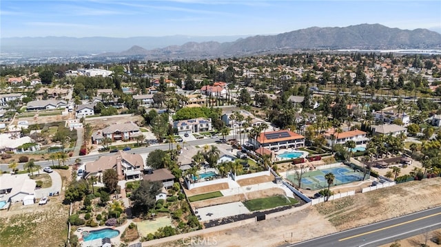 1042 Coronet Dr, Riverside, CA 92506 - aerial view of residential area featuring mountains and a pool