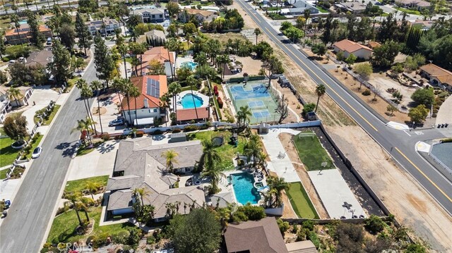 1042 Coronet Dr, Riverside, CA 92506 - aerial view of property and surrounding area with a pool area and nearby suburban area