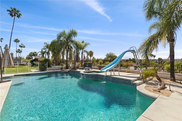1042 Coronet Dr, Riverside, CA 92506 - view of swimming pool with a water slide and a patio