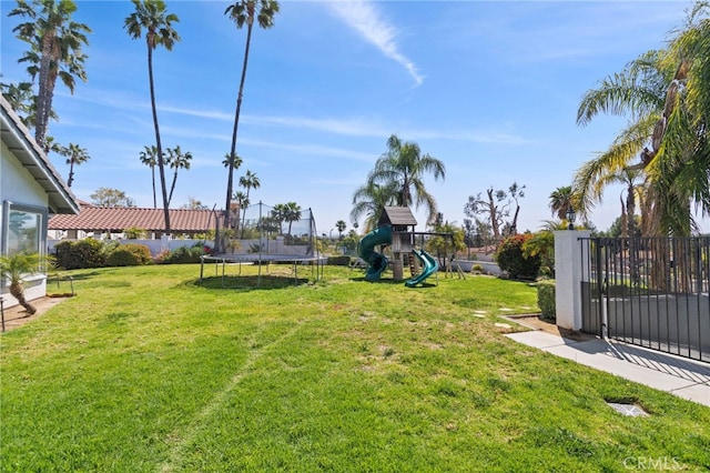 1042 Coronet Dr, Riverside, CA 92506 - view of yard featuring a trampoline and a playground