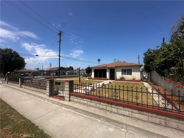 8647 Passons Blvd, Pico Rivera, CA 90660 - view of front of property featuring a fenced front yard and stucco siding