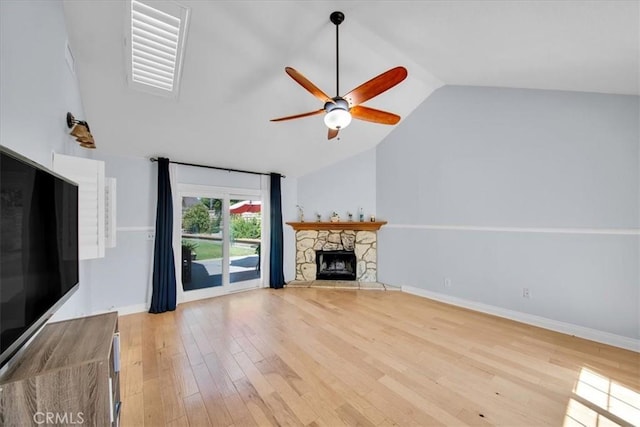 26010 Coronado Ct, Valencia, CA 91355 - unfurnished living room featuring ceiling fan, lofted ceiling, light wood-style floors, and a fireplace
