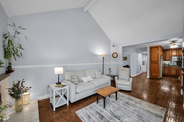 26010 Coronado Ct, Valencia, CA 91355 - living room with dark wood-style floors, high vaulted ceiling, and beam ceiling