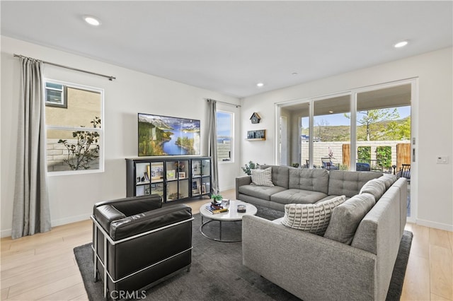 27774 Marquee Dr, Valencia, CA 91381 - living room featuring light wood finished floors and recessed lighting