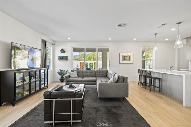 27774 Marquee Dr, Valencia, CA 91381 - living area featuring light wood-style flooring and recessed lighting