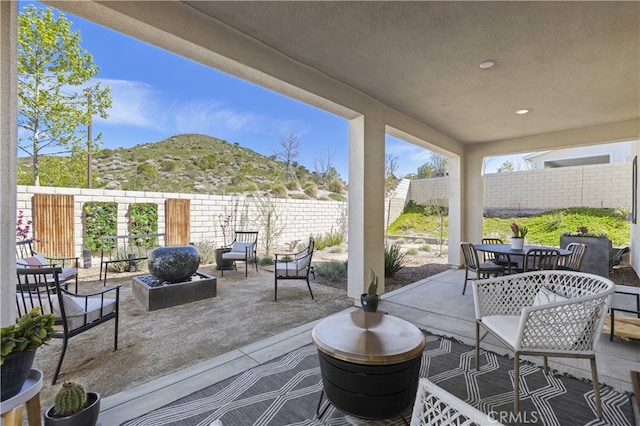 27774 Marquee Dr, Valencia, CA 91381 - fenced backyard featuring a mountain view, outdoor dining space, and a patio area