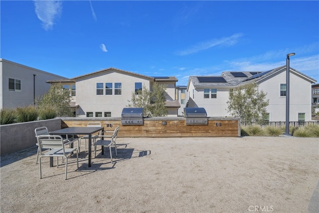27774 Marquee Dr, Valencia, CA 91381 - surrounding community with an outdoor kitchen and outdoor dining area