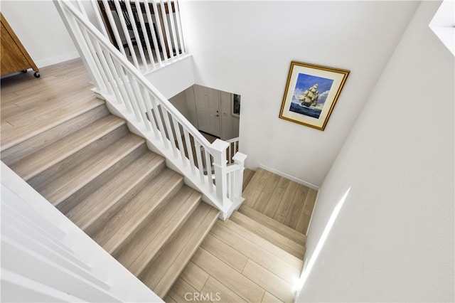 27774 Marquee Dr, Valencia, CA 91381 - stairway featuring wood finished floors and baseboards