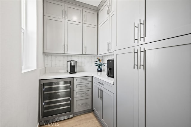 27774 Marquee Dr, Valencia, CA 91381 - bar featuring wine cooler and light wood finished floors