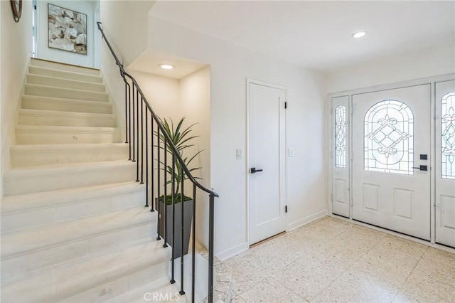 23509 Community St, West Hills, CA 91304 - foyer entrance featuring stairway and recessed lighting