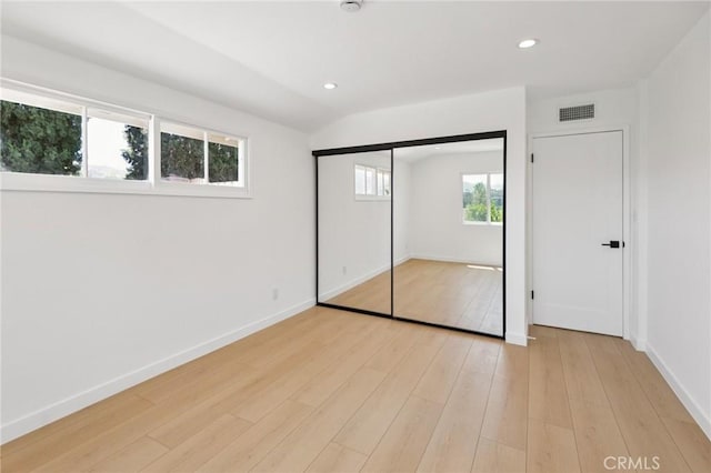 23509 Community St, West Hills, CA 91304 - unfurnished bedroom with light wood-style flooring, recessed lighting, and a closet