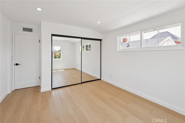 23509 Community St, West Hills, CA 91304 - unfurnished bedroom featuring light wood-type flooring, a closet, and recessed lighting