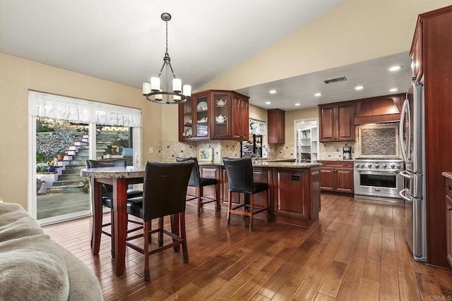 1896 Via Del Torrie, Alpine, CA 91901 - dining space with a chandelier, vaulted ceiling, dark wood finished floors, and recessed lighting