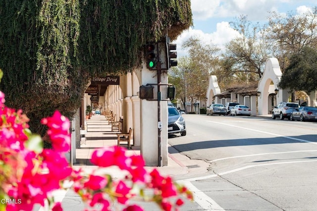 406 Santa Ana St, Ojai, CA 93023 - view of asphalt street featuring sidewalks, traffic lights, curbs, and stairs